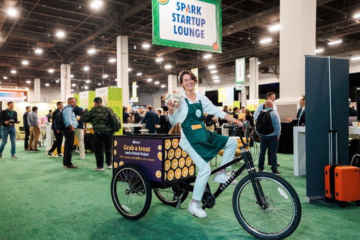 Groceryshop 2026 attendees at a show-floor activation where exhibitors can use B2Brain lead capture