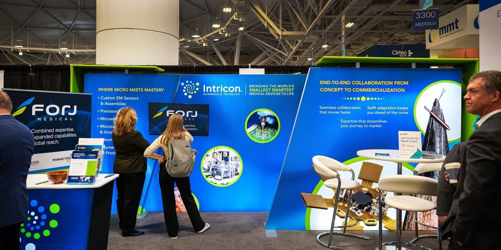 Visitors examining the Forj Medical exhibit at MD&M Midwest 2025
