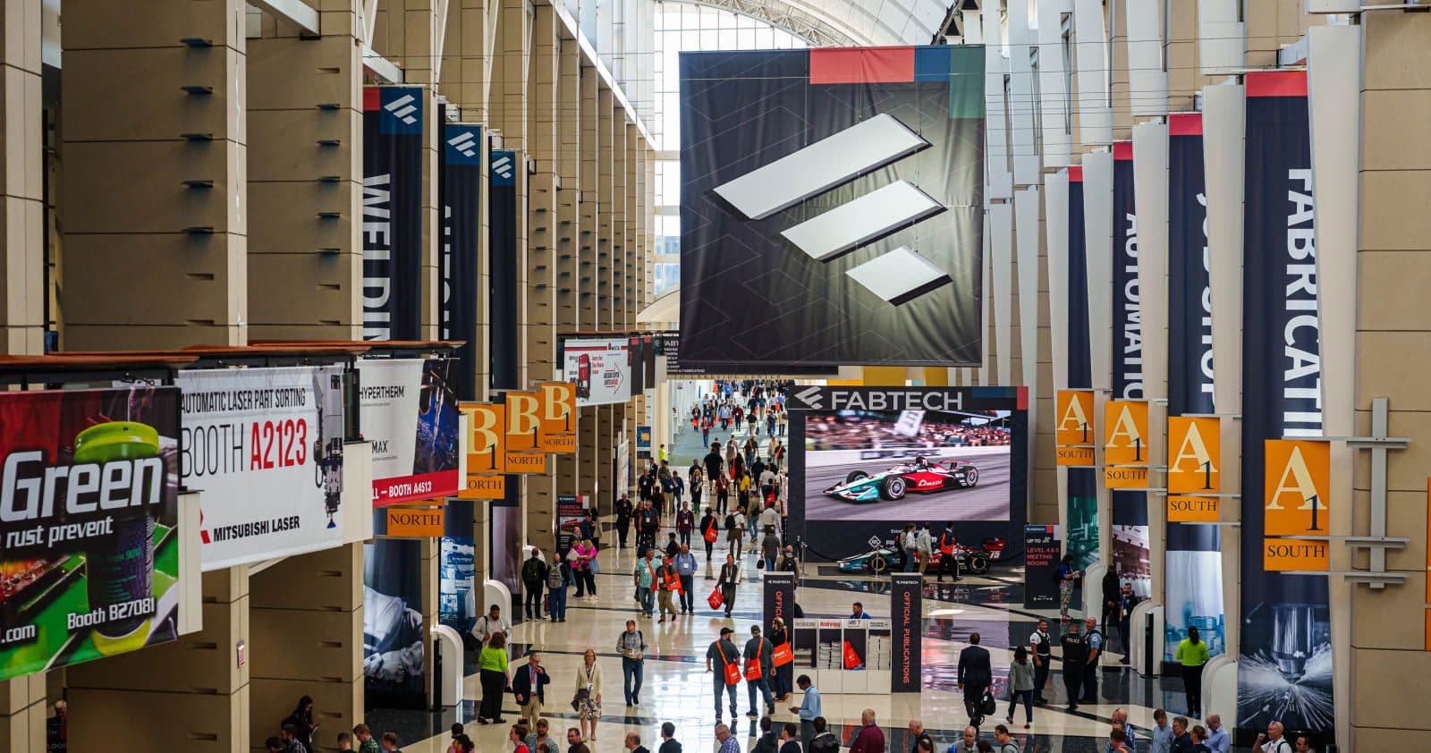 Attendees entering the FABTECH 2025 exhibition halls in Chicago