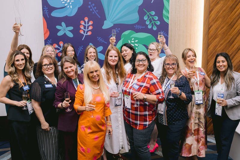 Women in Breakbulk attendees posing together at the 2025 event
