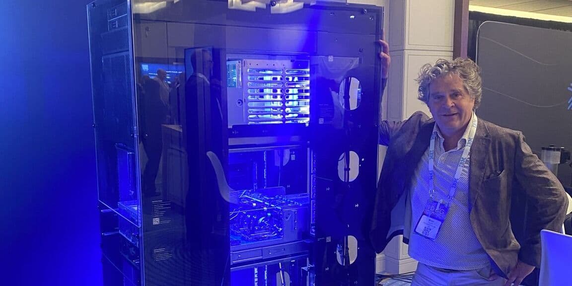 An IDUG NA 2025 attendee beside the IBM z17 exhibit