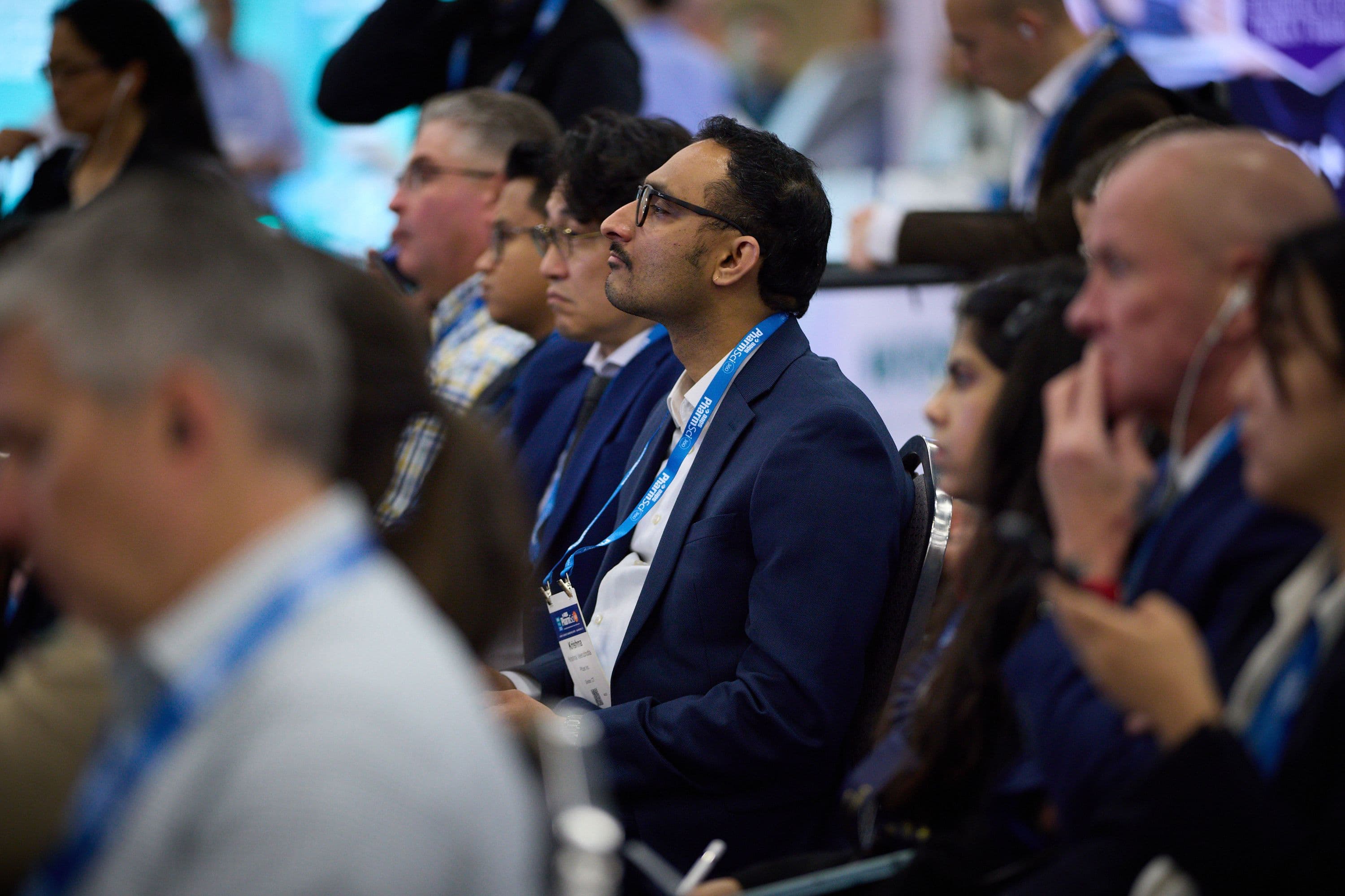 PharmSci 360 attendee listening during a scientific conference session