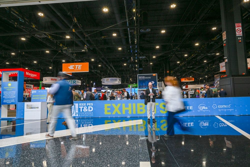 Attendees entering the IEEE PES T&D 2026 exhibit hall at McCormick Place